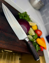 Premium stainless steel chef's knife for precision cutting, chopping, and slicing – professional-grade kitchen essential.